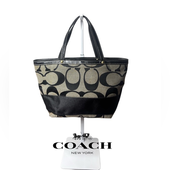 Coach Handbags - COACH SIGNATURE MONOGRAM Stylish Black and Tan Women's satchel